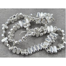 Гематит 4*8 мм товщ. 3 мм з поперечним отвором колір срібло довжина 39 см