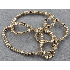 Гематит овал 2*4 мм товщ. 2 мм з поперечним отвором колір золото довжина 39-40 см