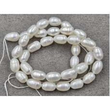 Бусины на нитке ~ 6*8 мм (речной) длина 34 см